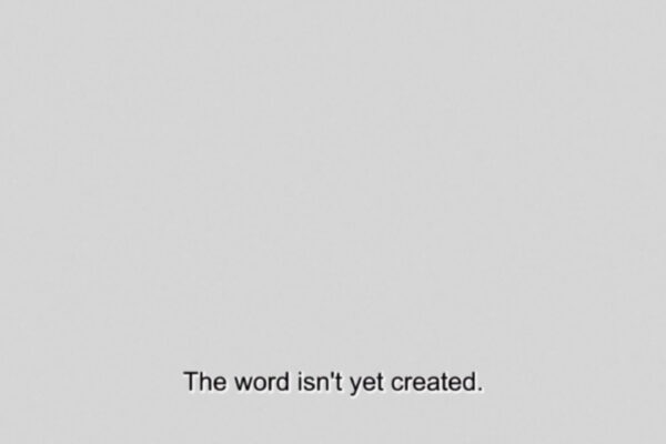 Lichtgrijs vlak met onderaan de tekst 'The word isn't yet created' in zwarte letters, zoals de ondertitels bij een film. 

Light grey background with the text 'The word isn't yet created' in black letters at the bottom, like the subtitles of a film.